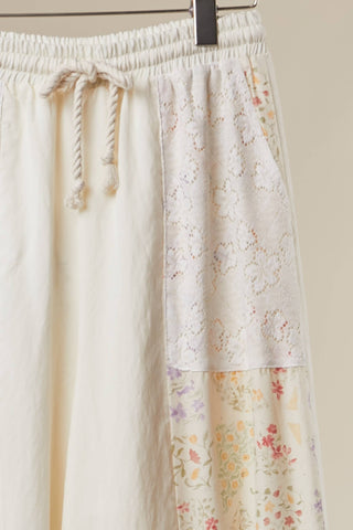 Floral Patchwork Ruffle Pant – Flowy Boho Pants with Asymmetrical Hem
