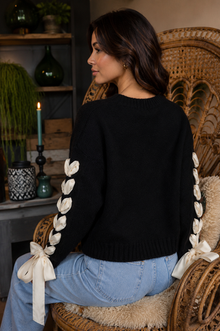 Wrapped in Wonder Sweater – Cable Knit Sweater with Statement Ribbon Sleeves