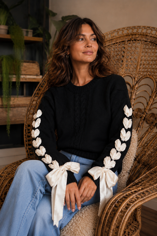 Wrapped in Wonder Sweater – Cable Knit Sweater with Statement Ribbon Sleeves